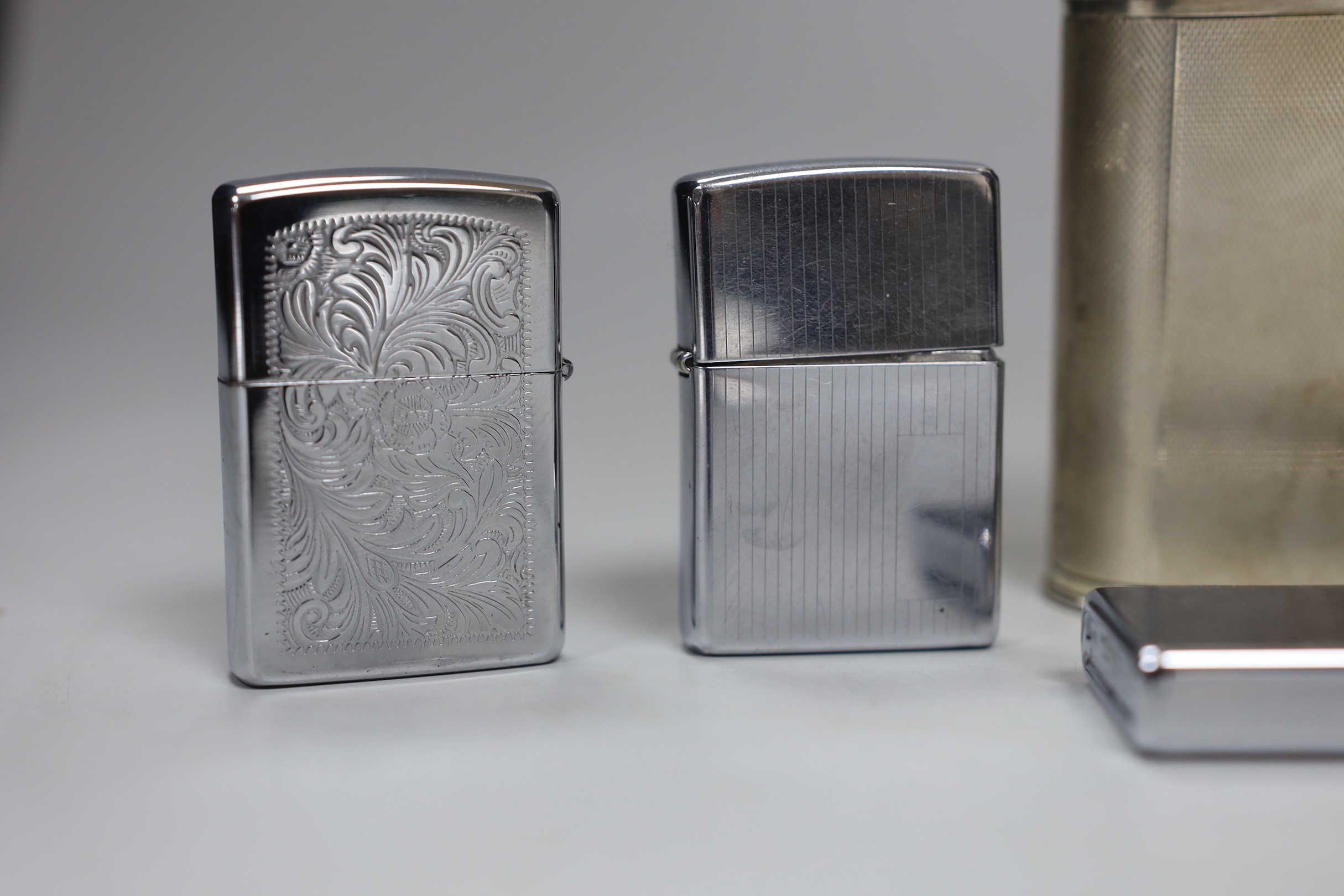 A Dunhill plated table lighter and six various other lighters, Dunhill table lighter 10cm high